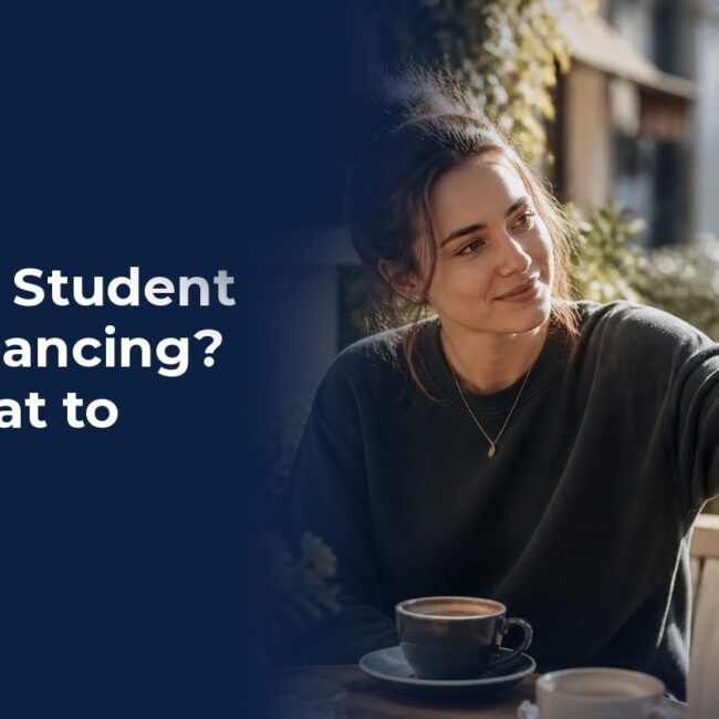 Two friends talking over coffee on a sunny patio one encouraging the other after a student loan refinance denial